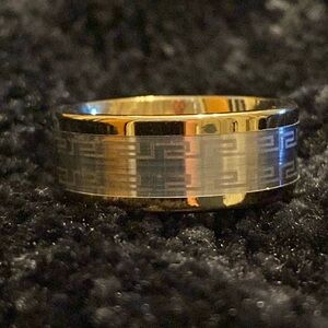Stainless steel ring. Gold and silver tone. Size 8